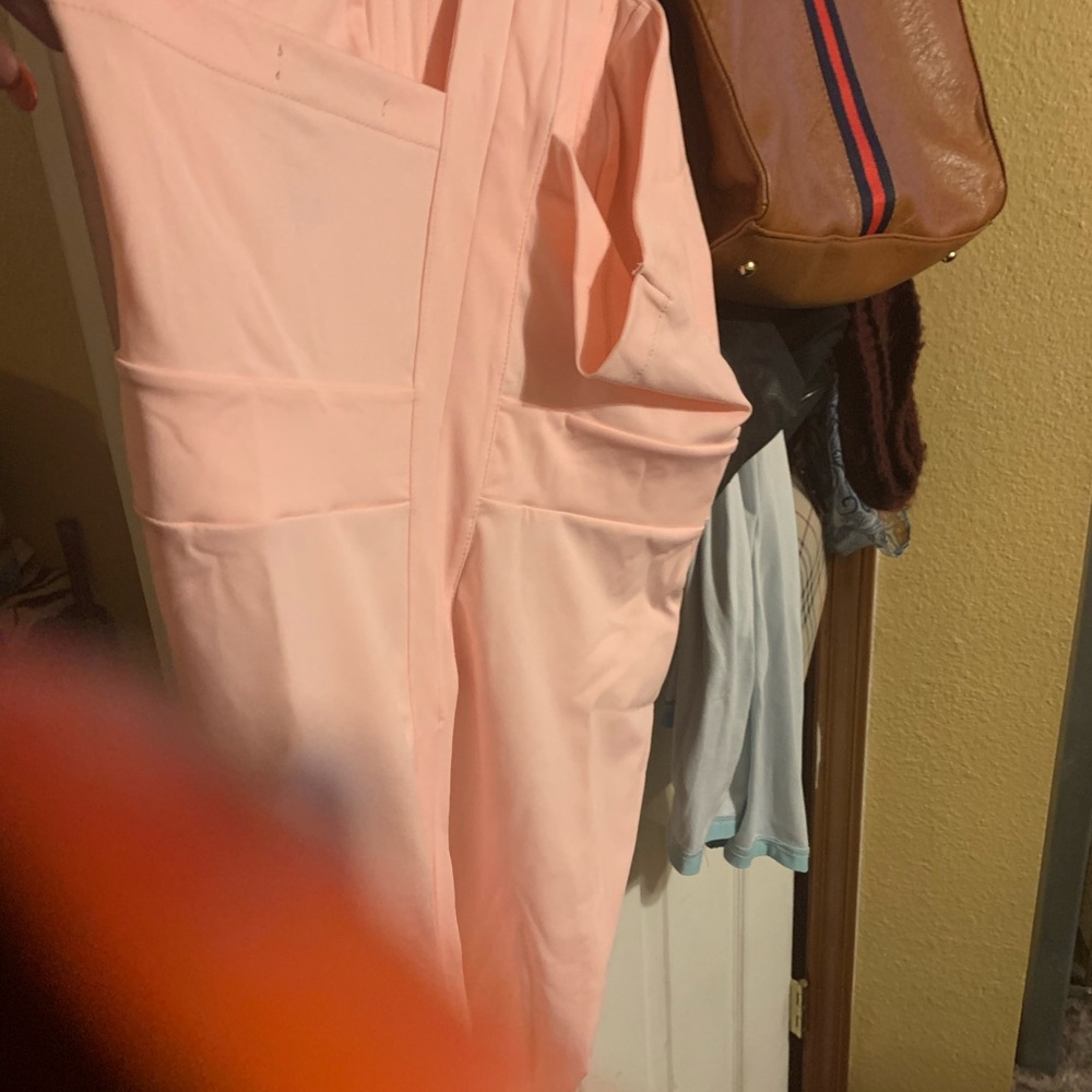 Light pink dress with jewel neck and backless